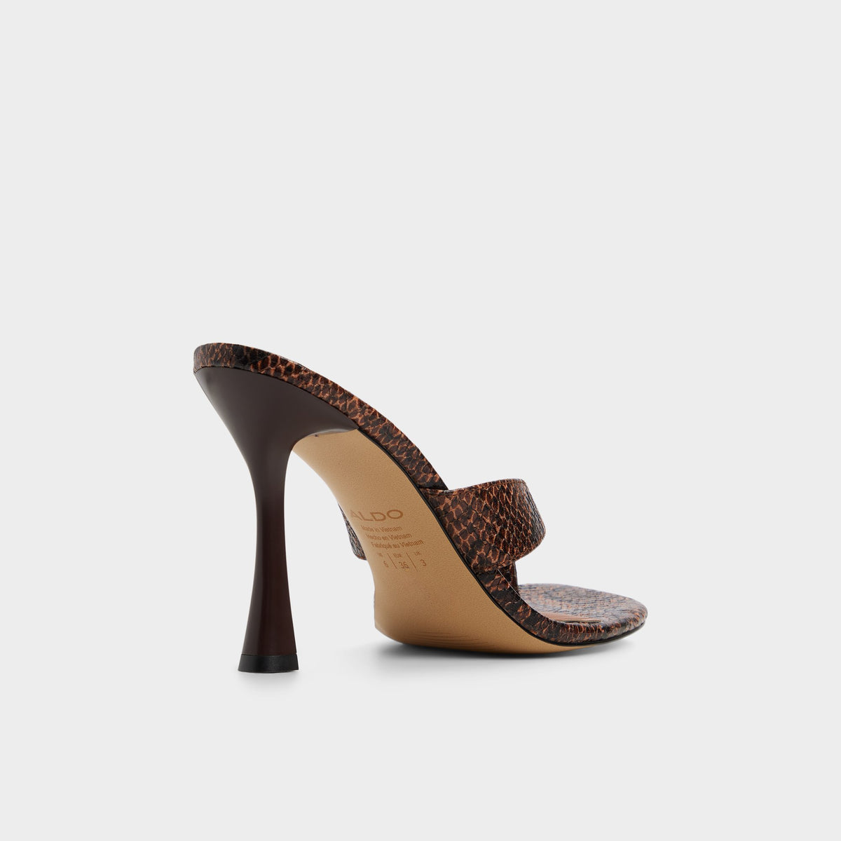 Three-quarter angle of Open brown Haayssie Heeled flip flop's back side