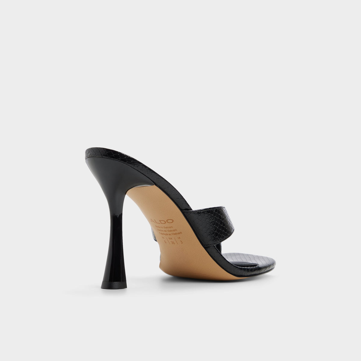 Three-quarter angle of Black Haayssie Heeled flip flop's back side