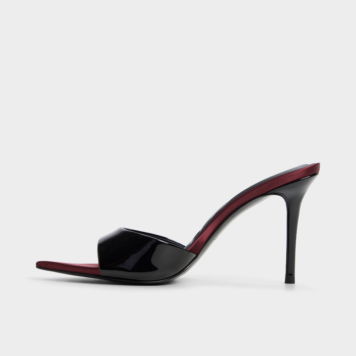 Side view of Black combo Reanna Heeled mule