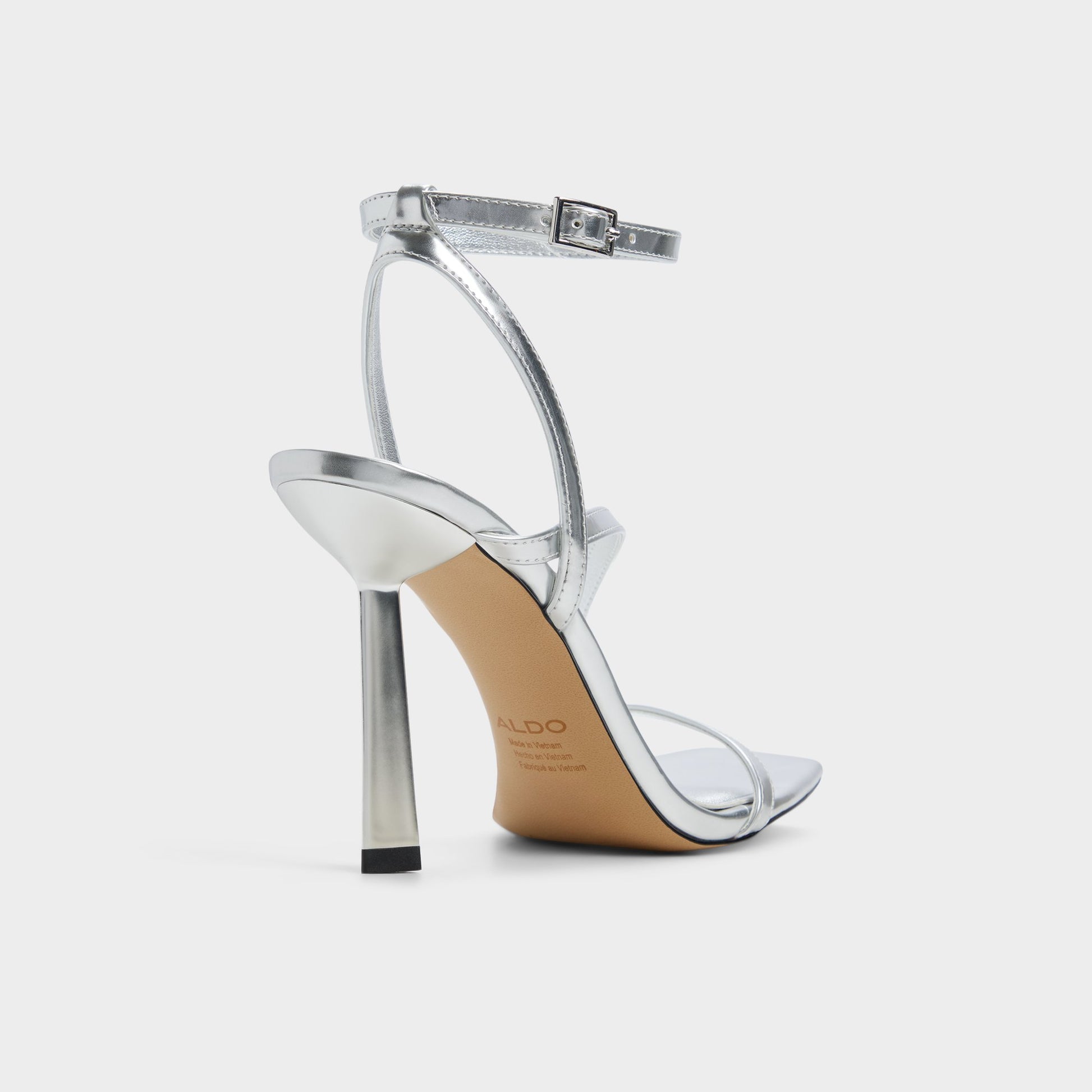 Three-quarter angle of Silver Scintilla Strappy heeled sandal's back side