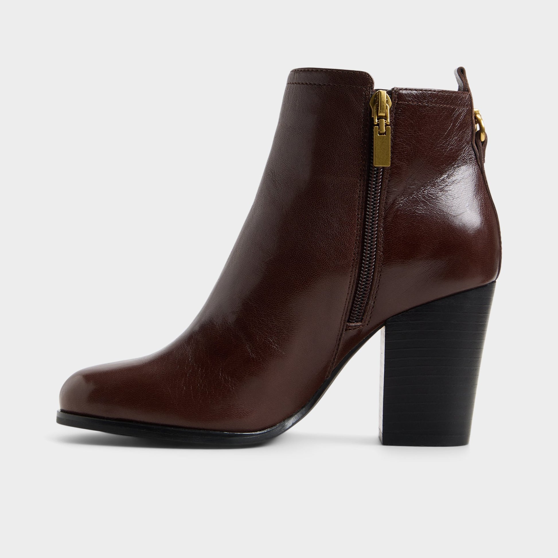 Side view of Dark brown Noemia Block heel ankle boot