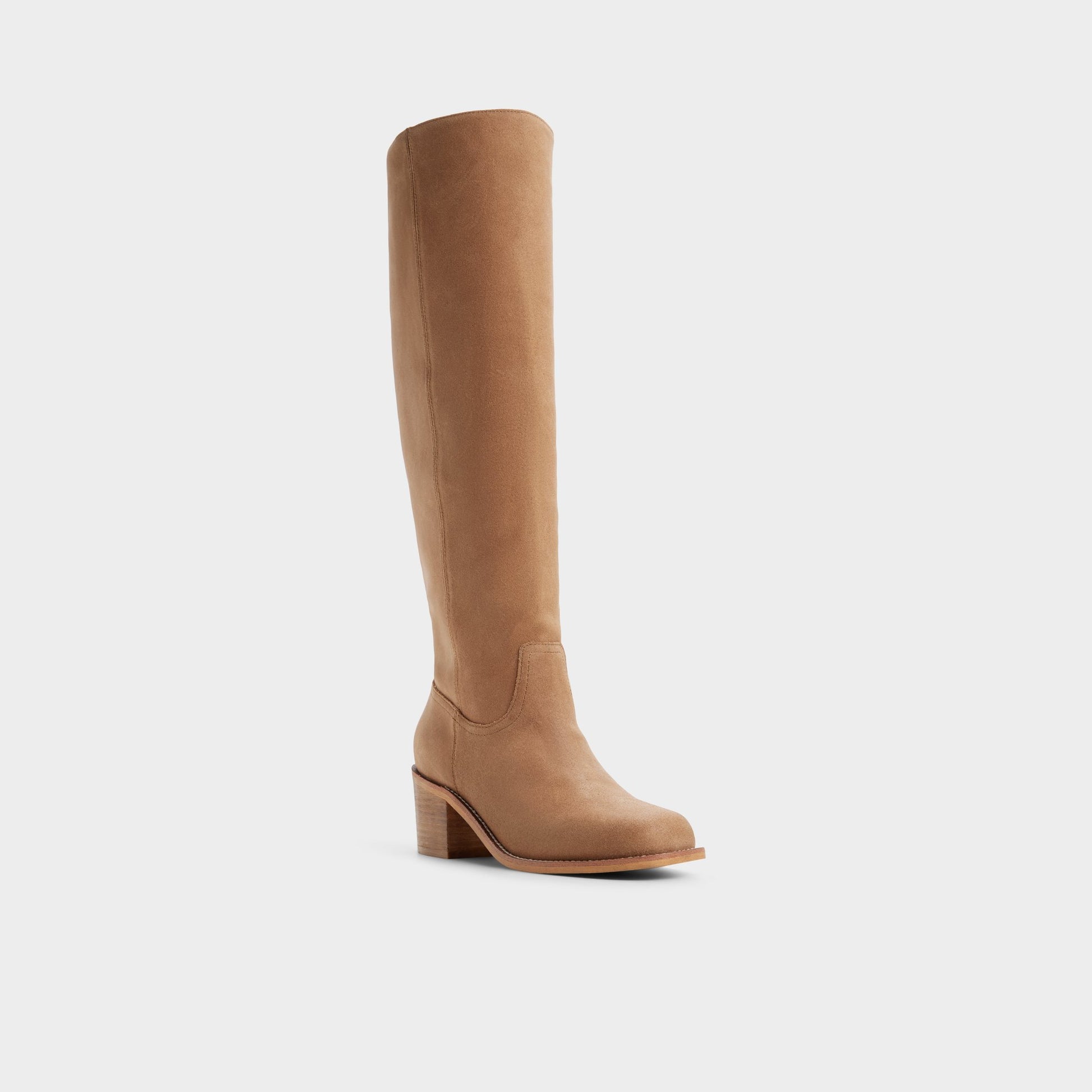 Three-quarter angle of Dark brown Haverton Block heel knee-high boot's front side