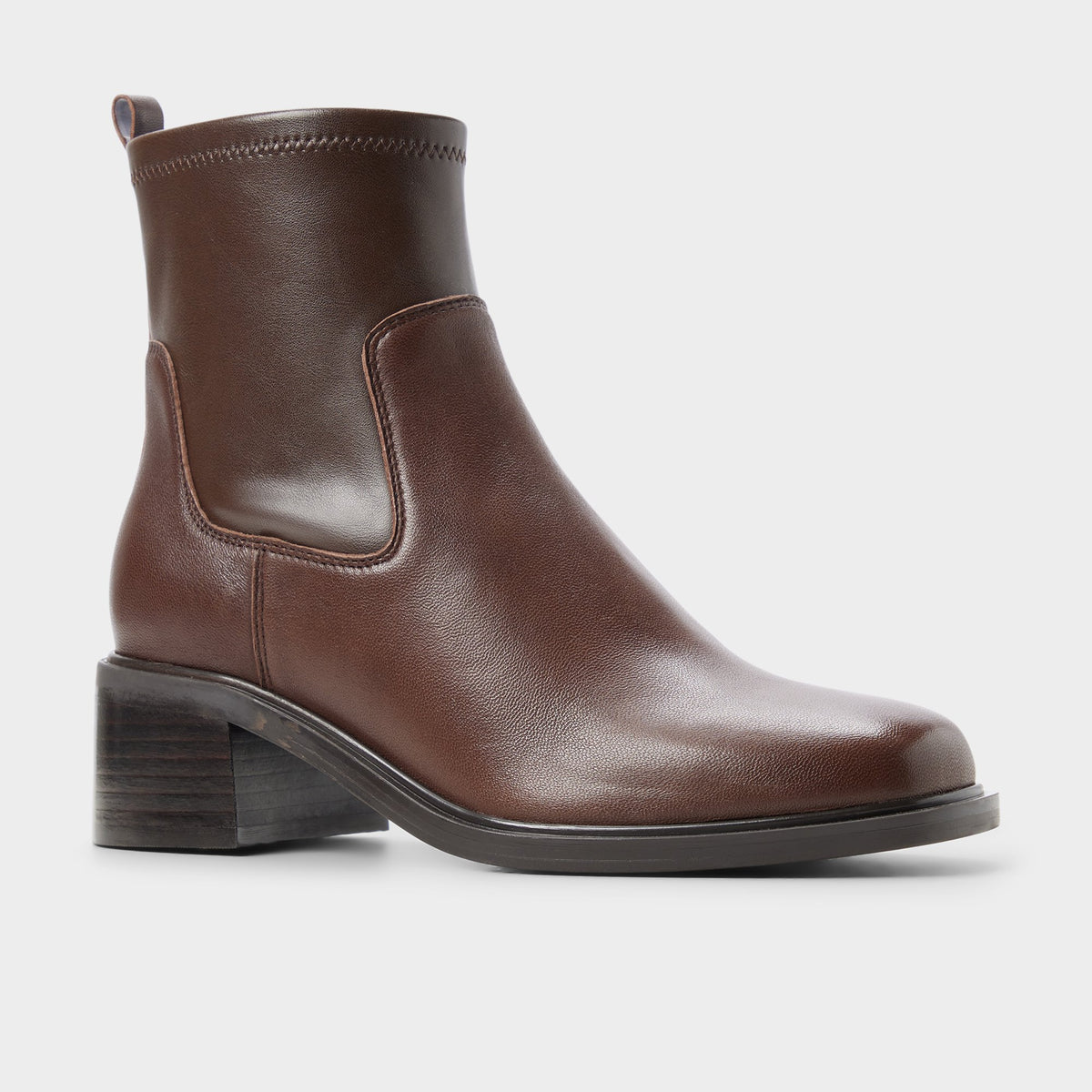Three-quarter angle of Dark brown Tywyn Block heel ankle boot's back side