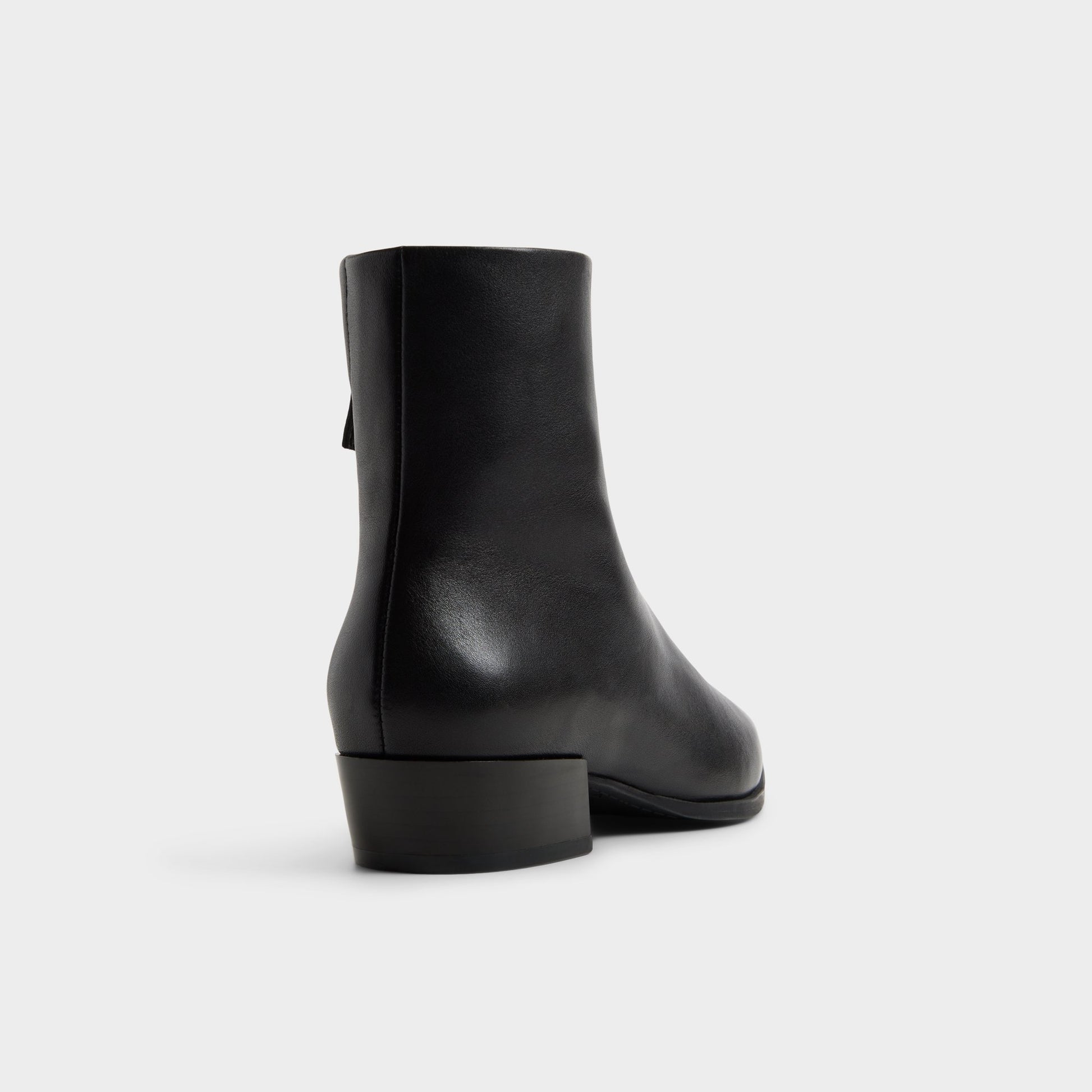Three-quarter angle of Black Zaylaa Block heel ankle boot's back side