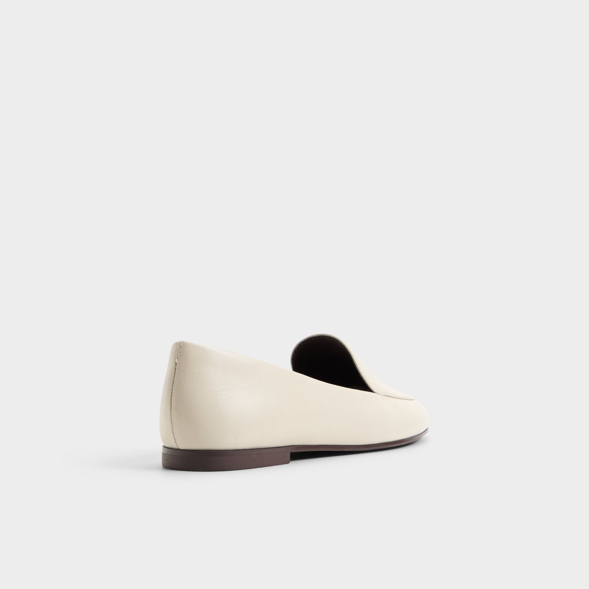 Three-quarter angle of White Daphia Loafer's back side