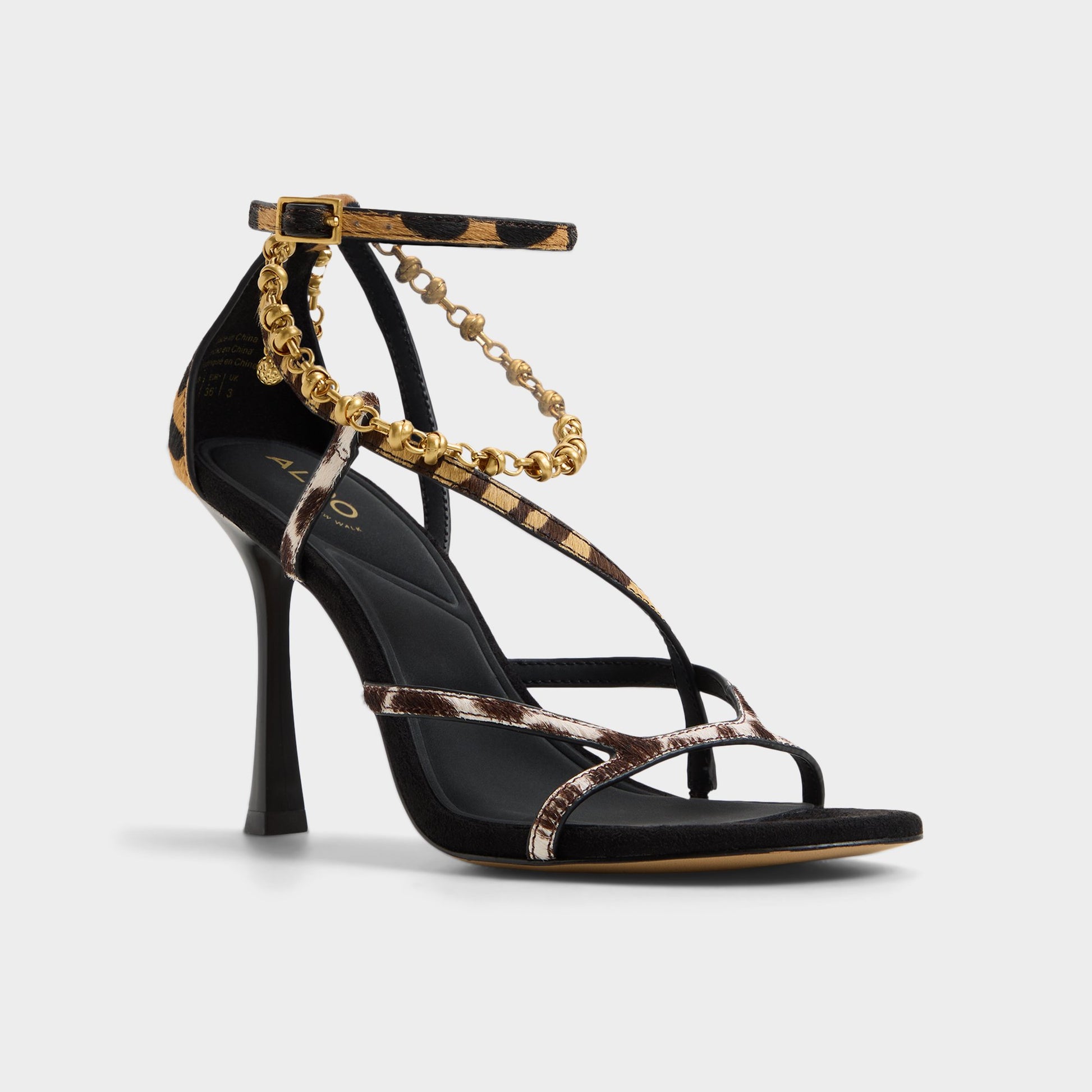 Three-quarter angle of Open brown Stayzie Strappy heeled sandal's front side