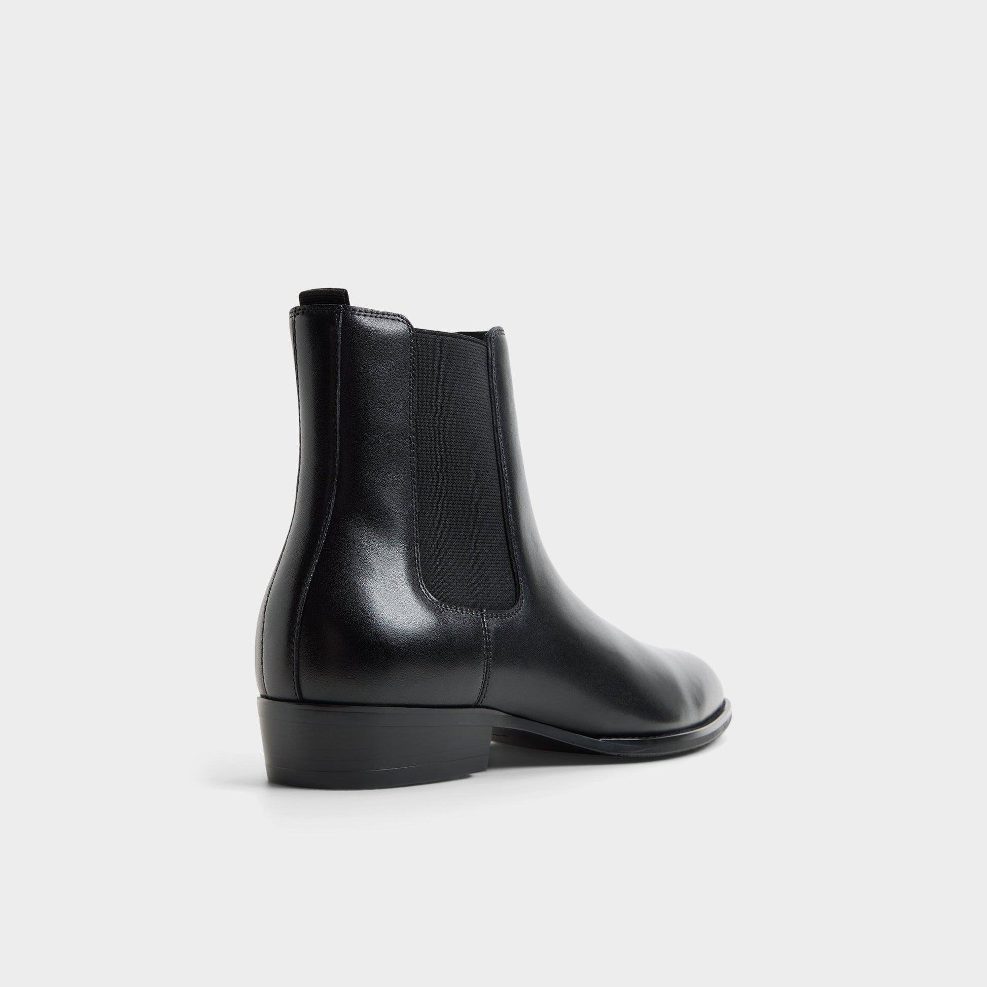 Three-quarter angle of Black combo Bert Chelsea boot's back side
