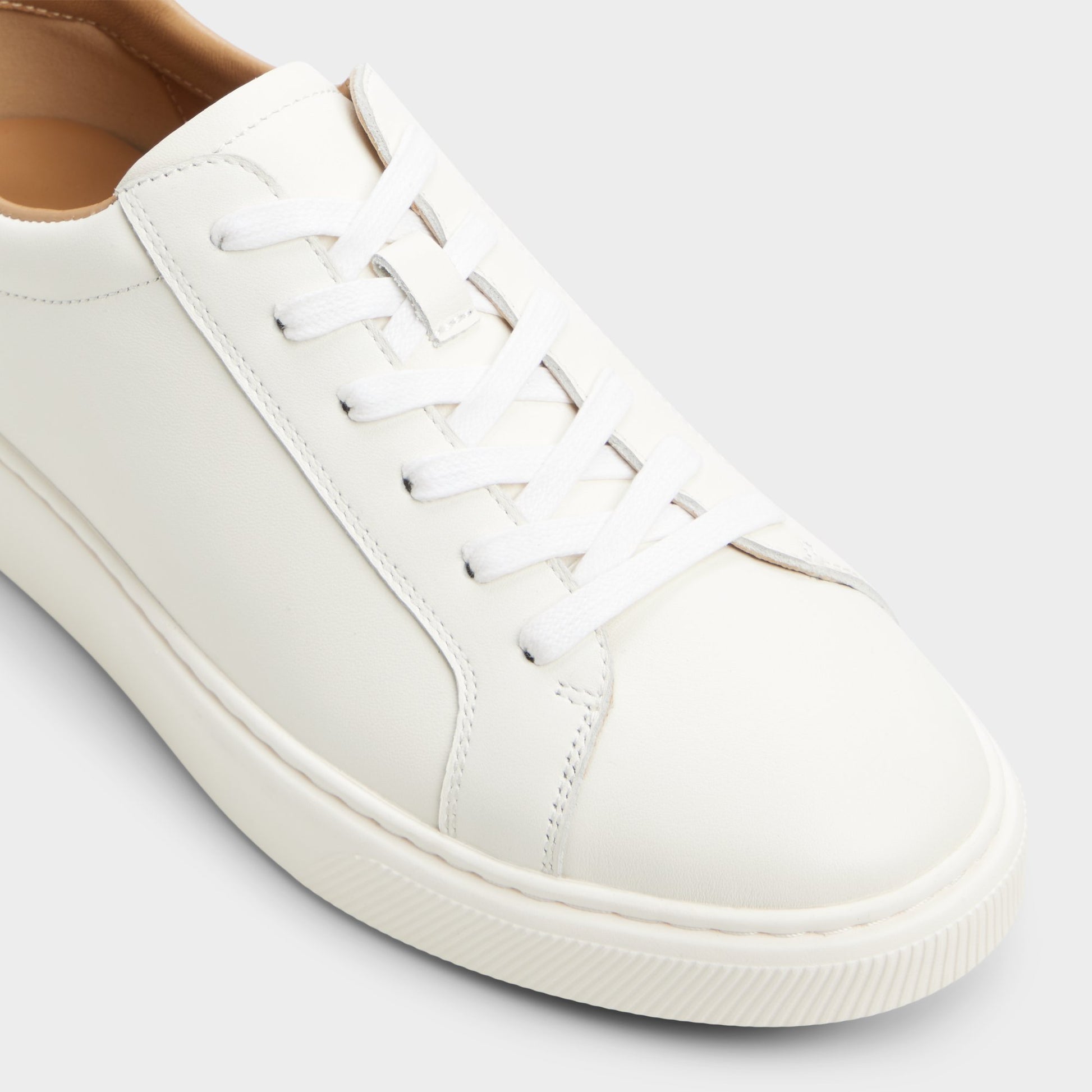 Three-quarter angle of White Garett Low top sneaker's front side