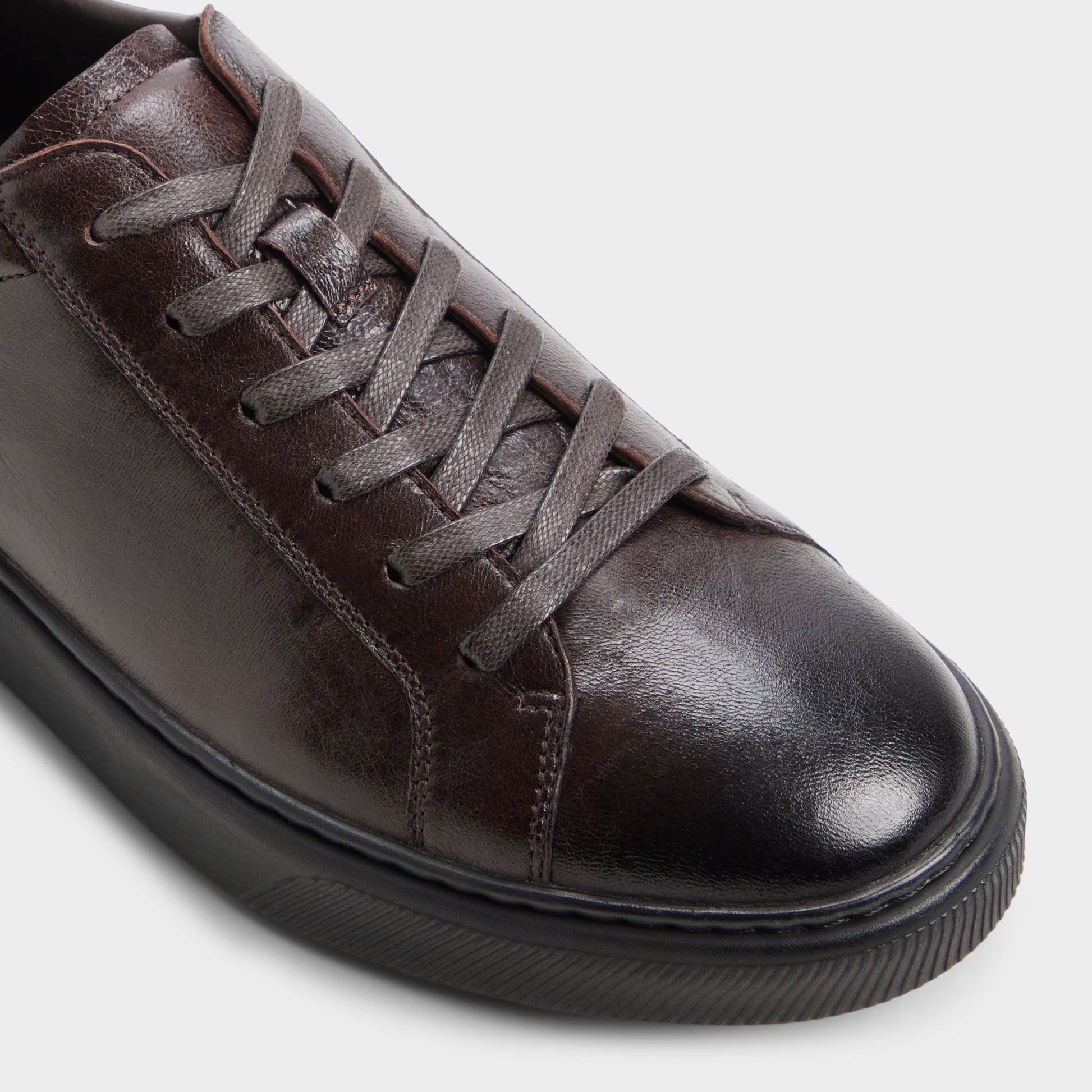 Three-quarter angle of Brown Garett Low top sneaker's front side