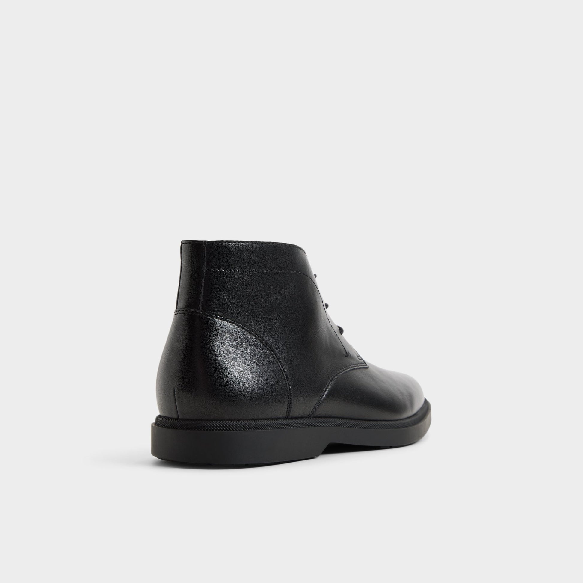 Three-quarter angle of Black Camdan Chukka boot's back side