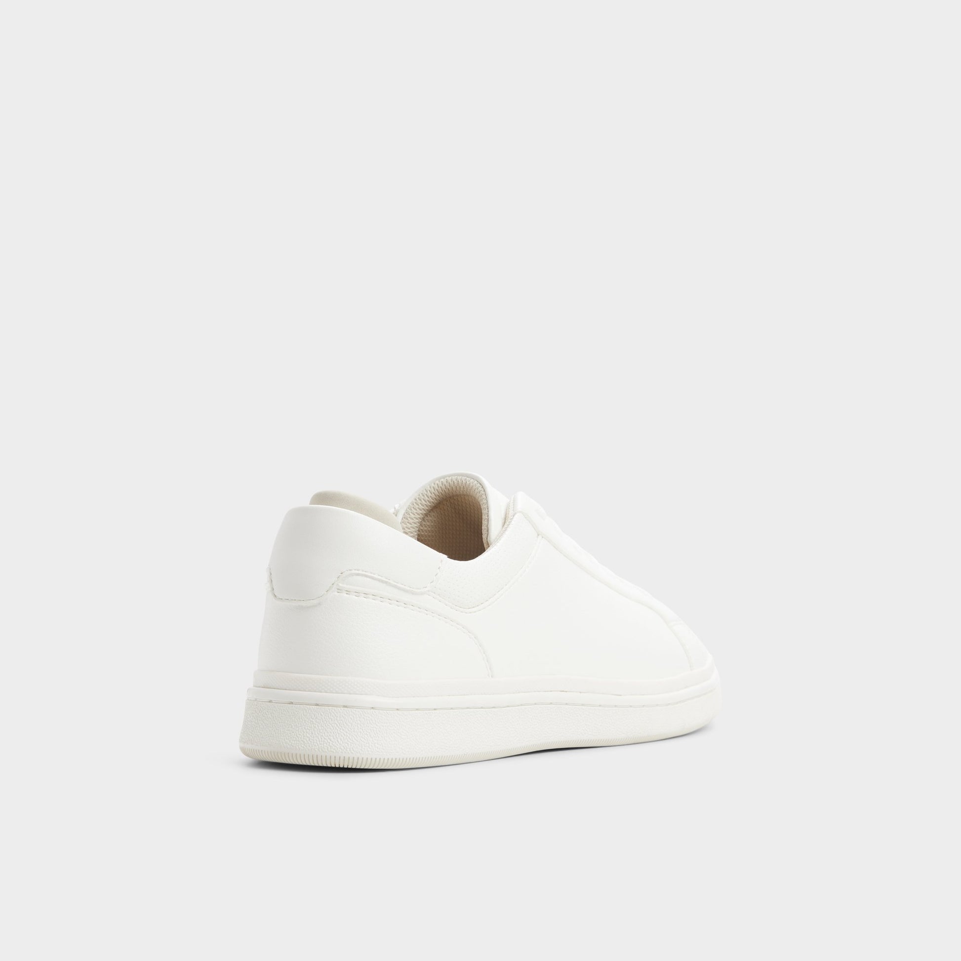Three-quarter angle of White Petey Slip-on's back side
