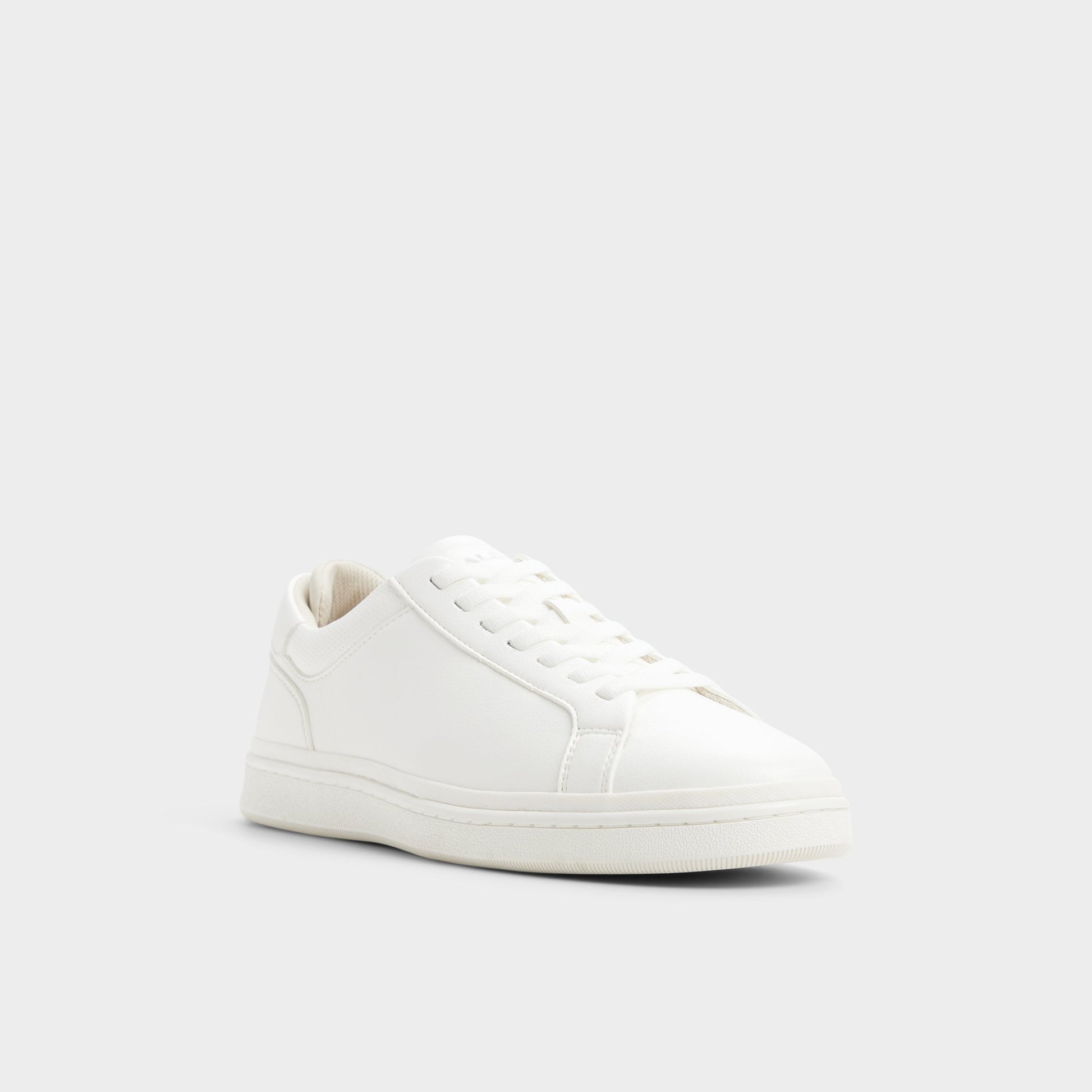 Three-quarter angle of White Petey Slip-on's front side