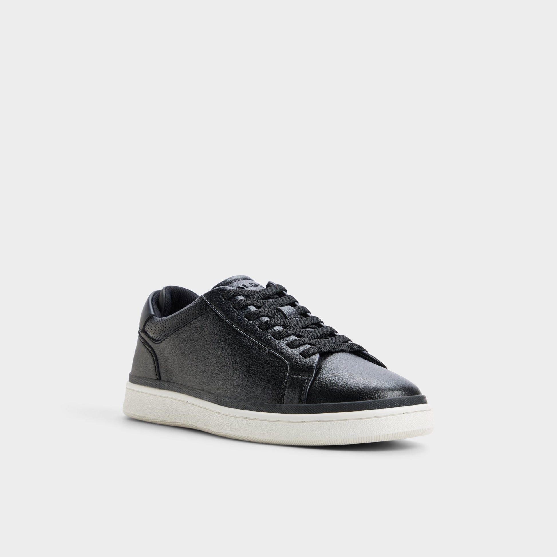 Three-quarter angle of Black Petey Slip-on's front side