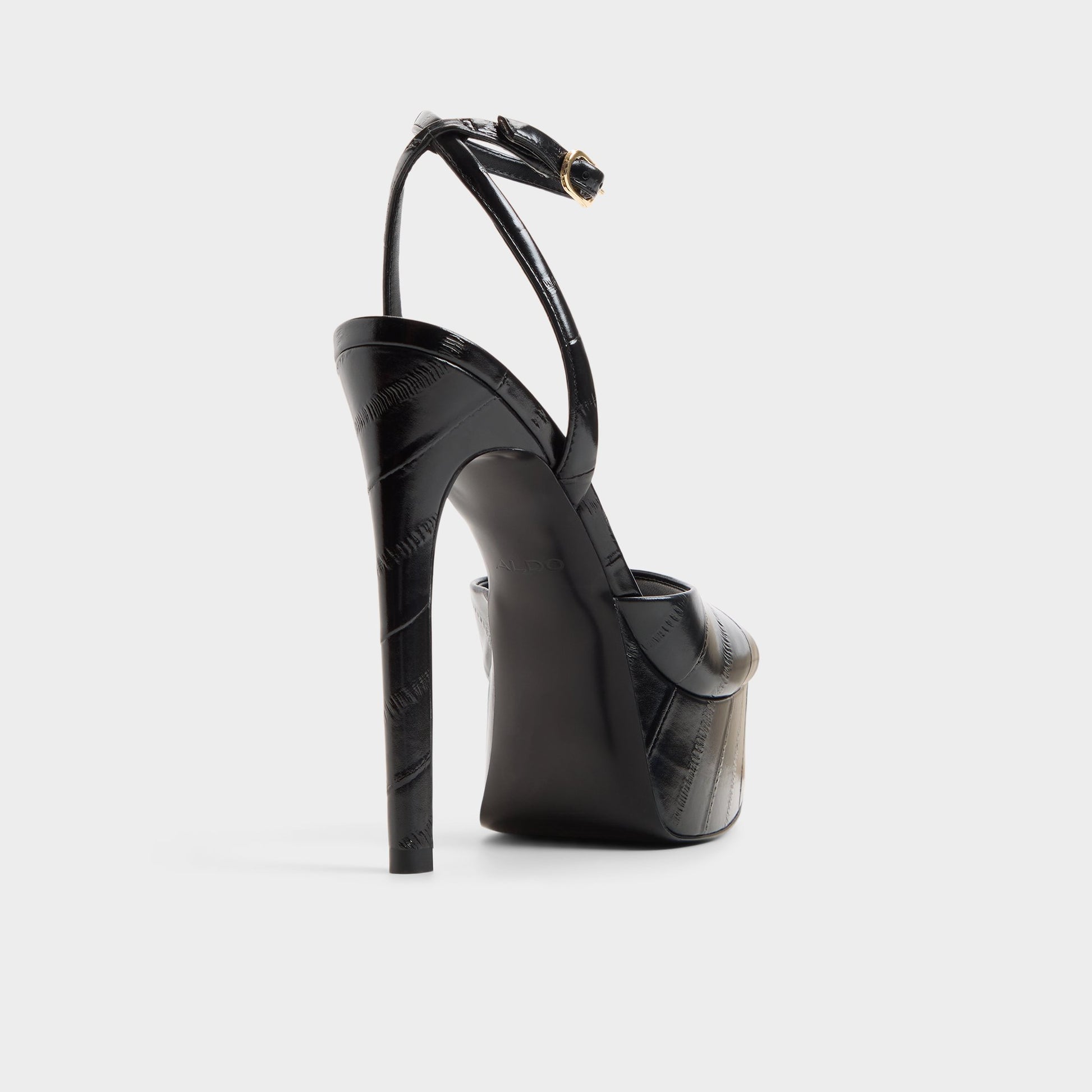 Three-quarter angle of Black Thalie Strappy heeled sandal's back side