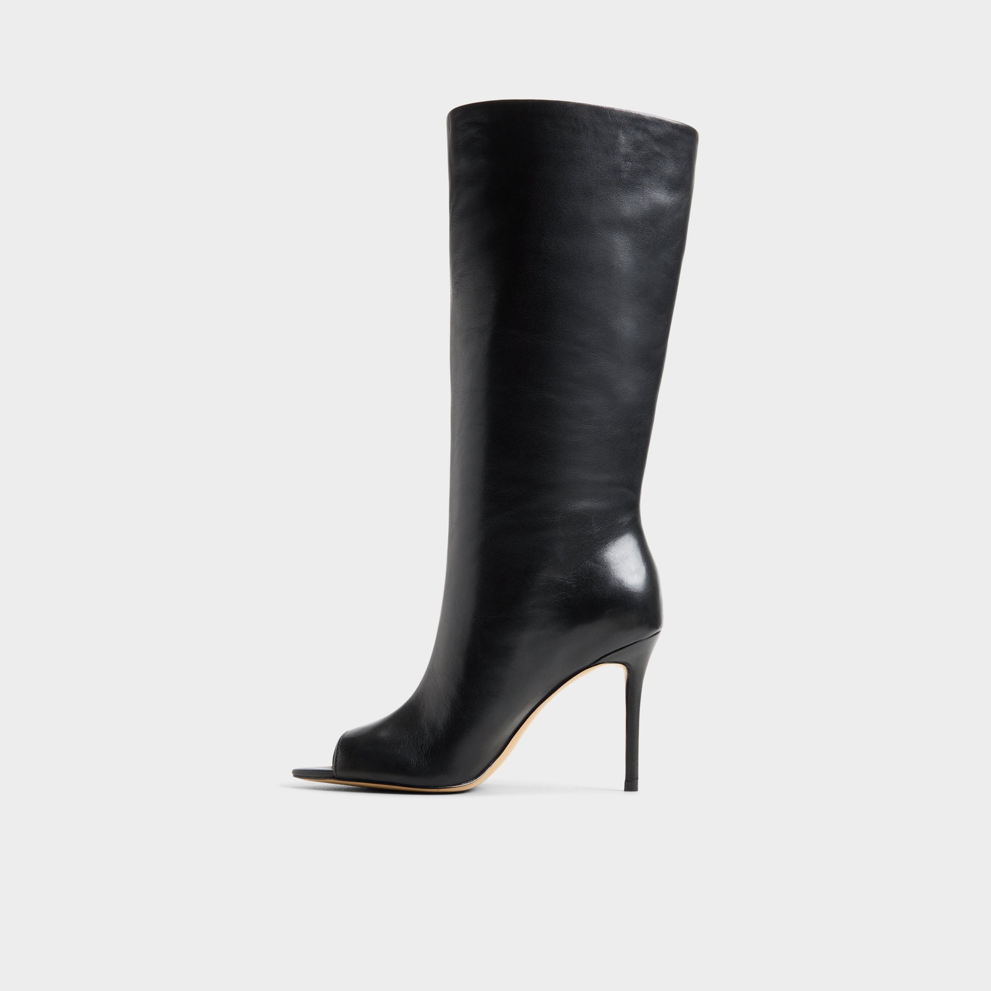 Side view of Black Zohey Mid-calf boot