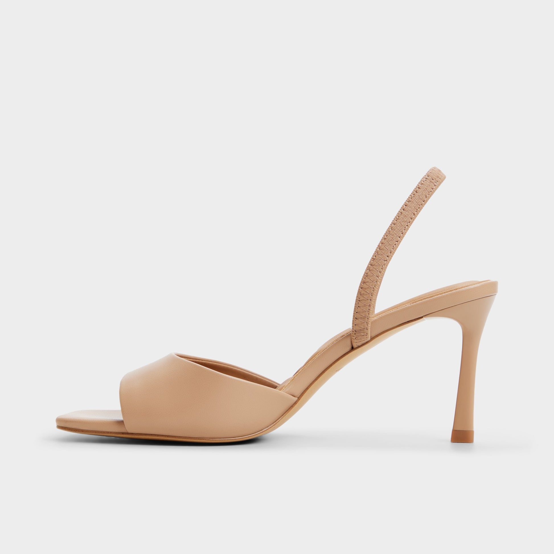 Side view of Beige Andya Slingback heeled sandal
