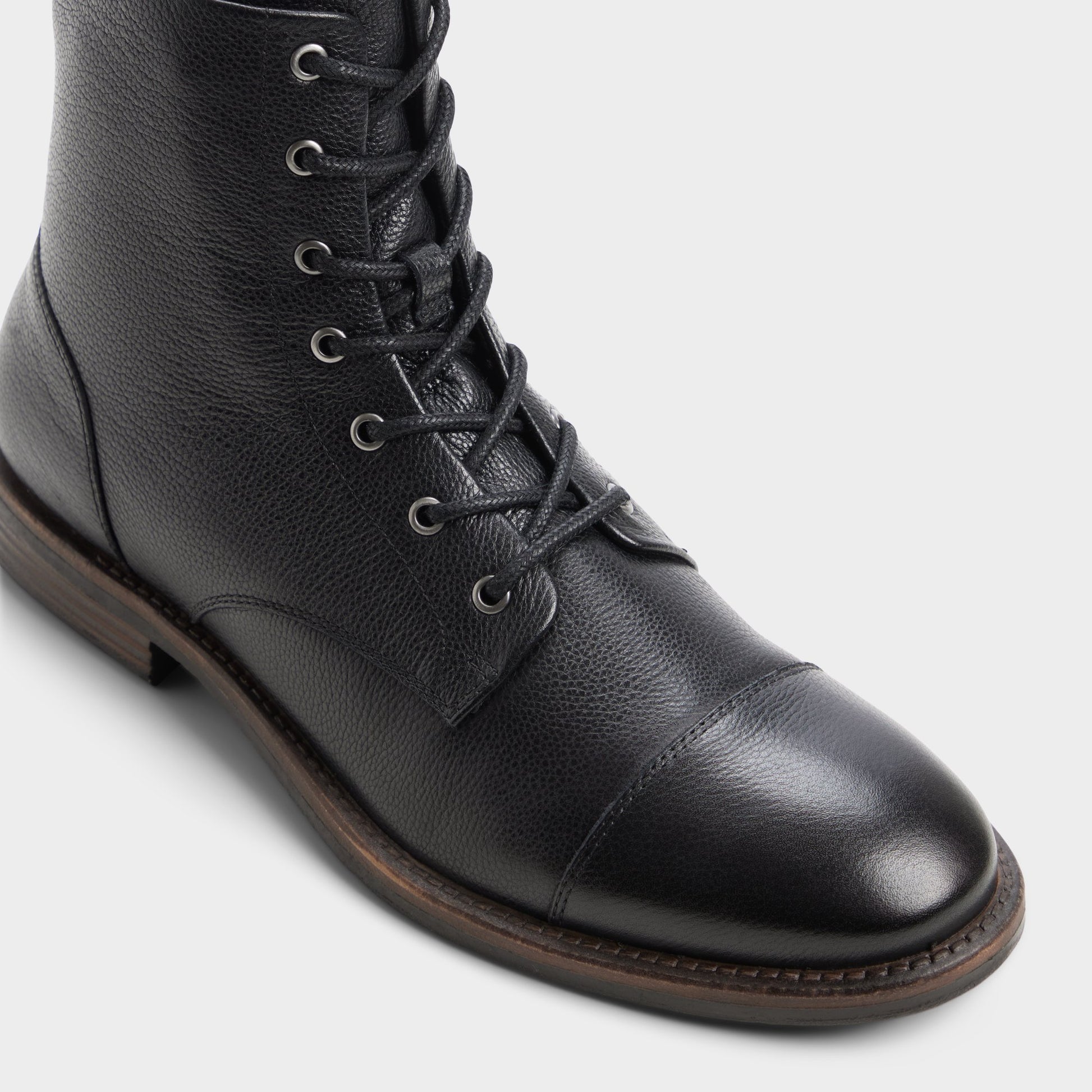 Three-quarter angle of Black Lazzar Lace-up boot's front side