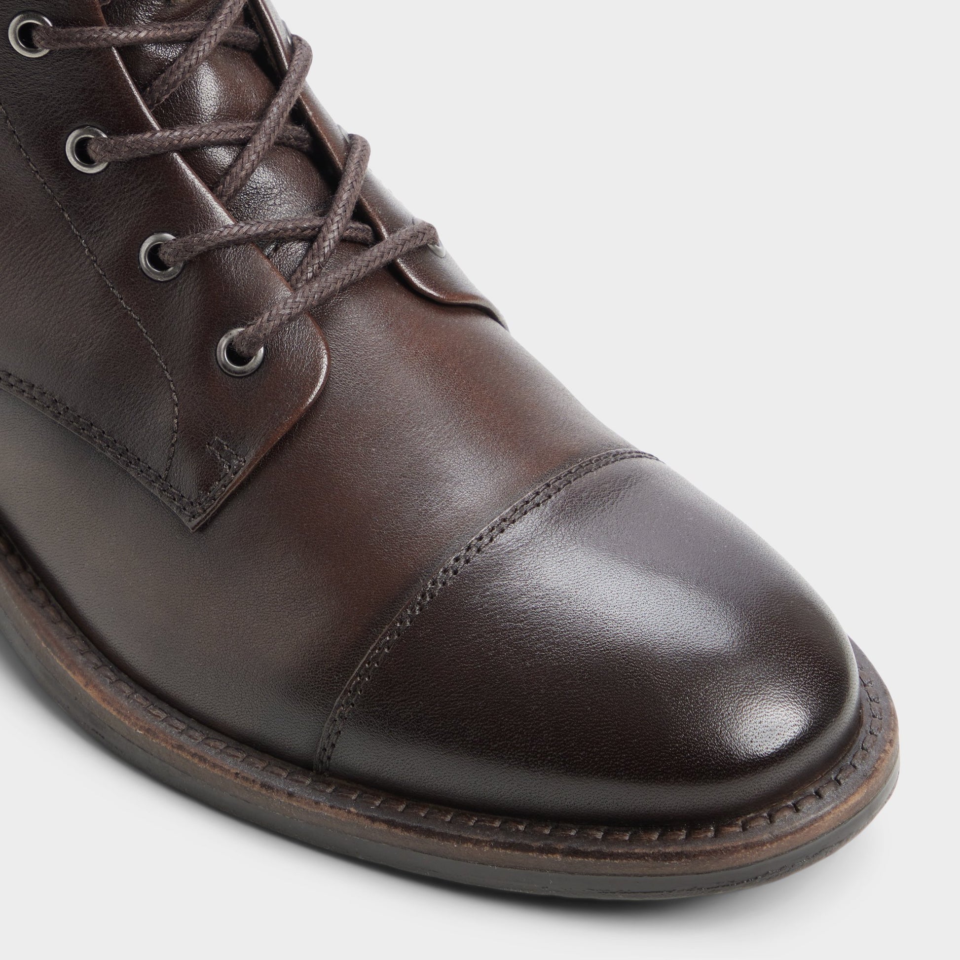 Three-quarter angle of Dark brown Lazzar Lace-up boot's front side