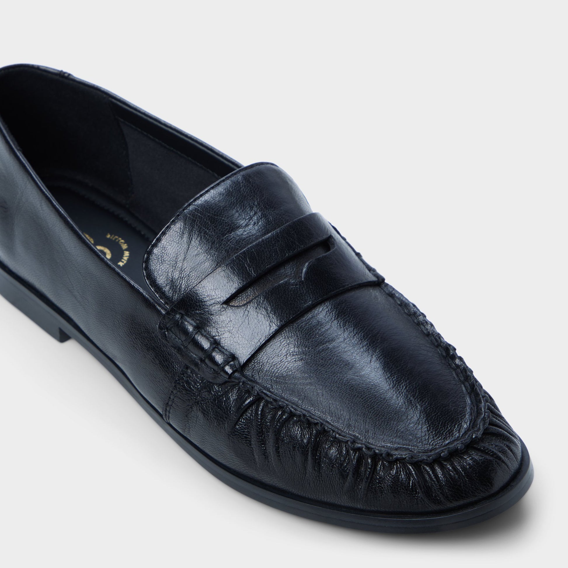 Three-quarter angle of Black Veviane Loafer's front side