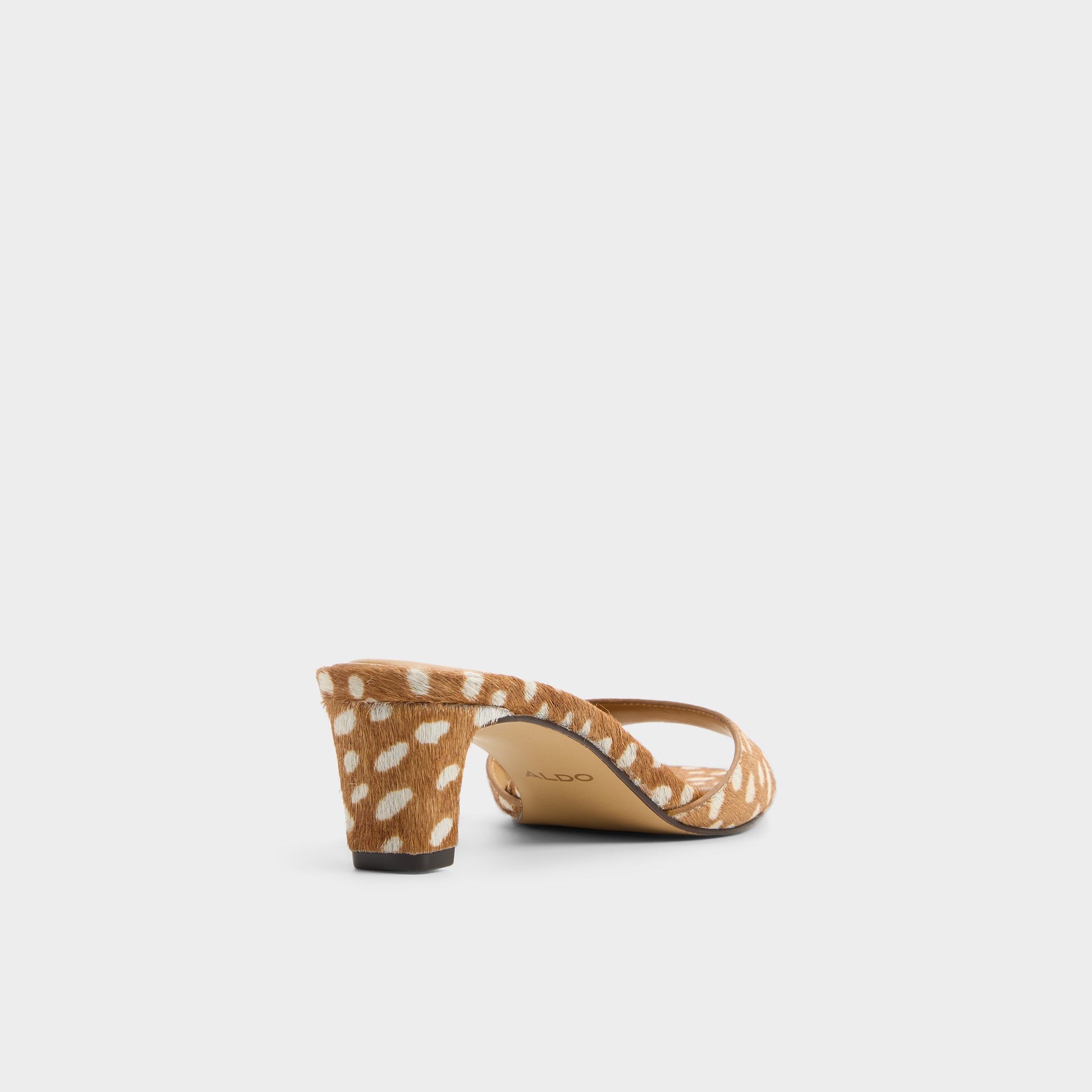 Three-quarter angle of Open brown Ankea Heeled mule's back side