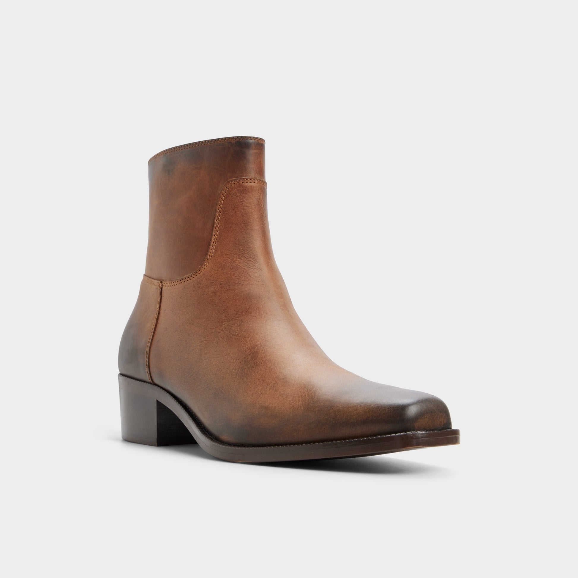 Three-quarter angle of Brown Renald Ankle boot's front side