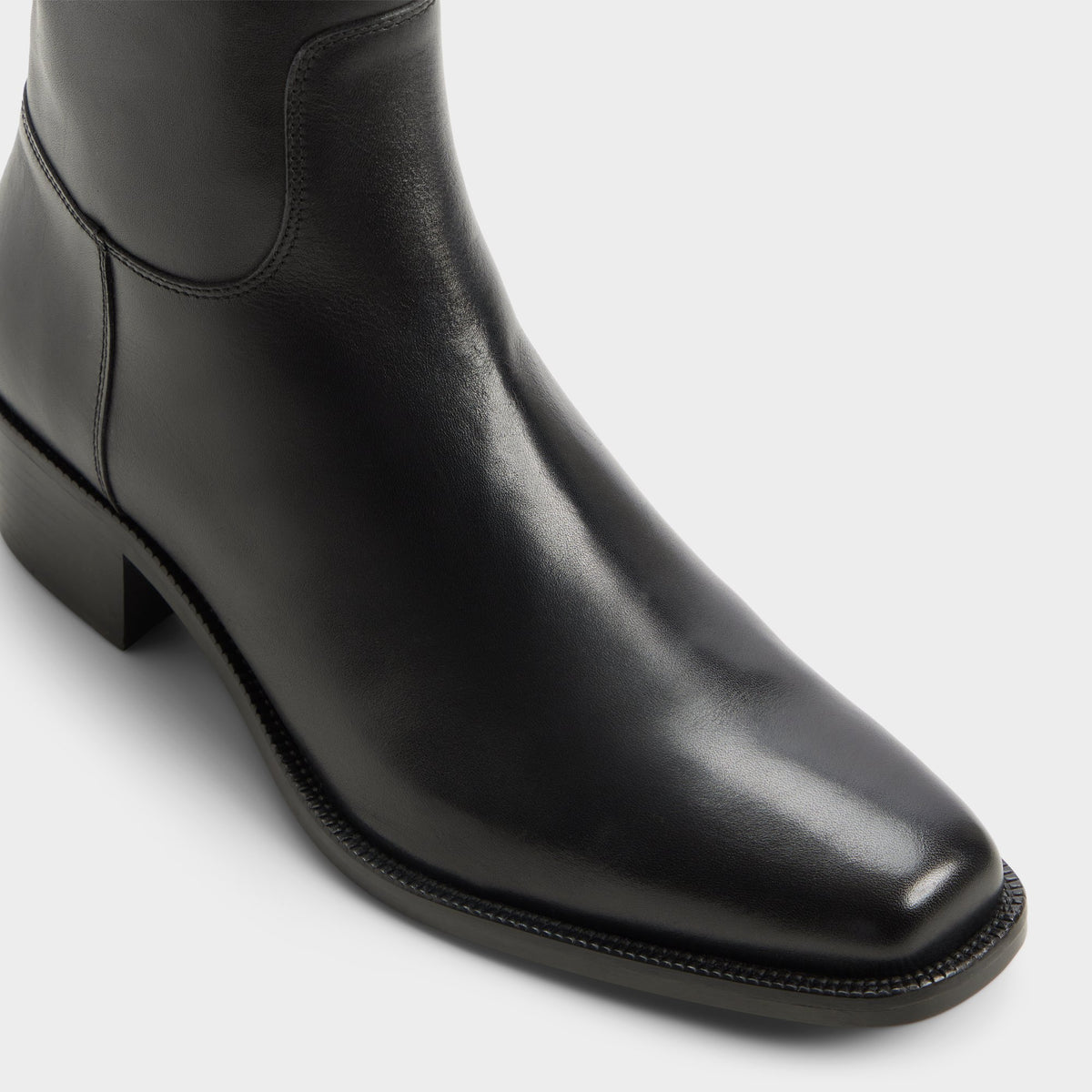 Three-quarter angle of Black Renald Ankle boot's front side