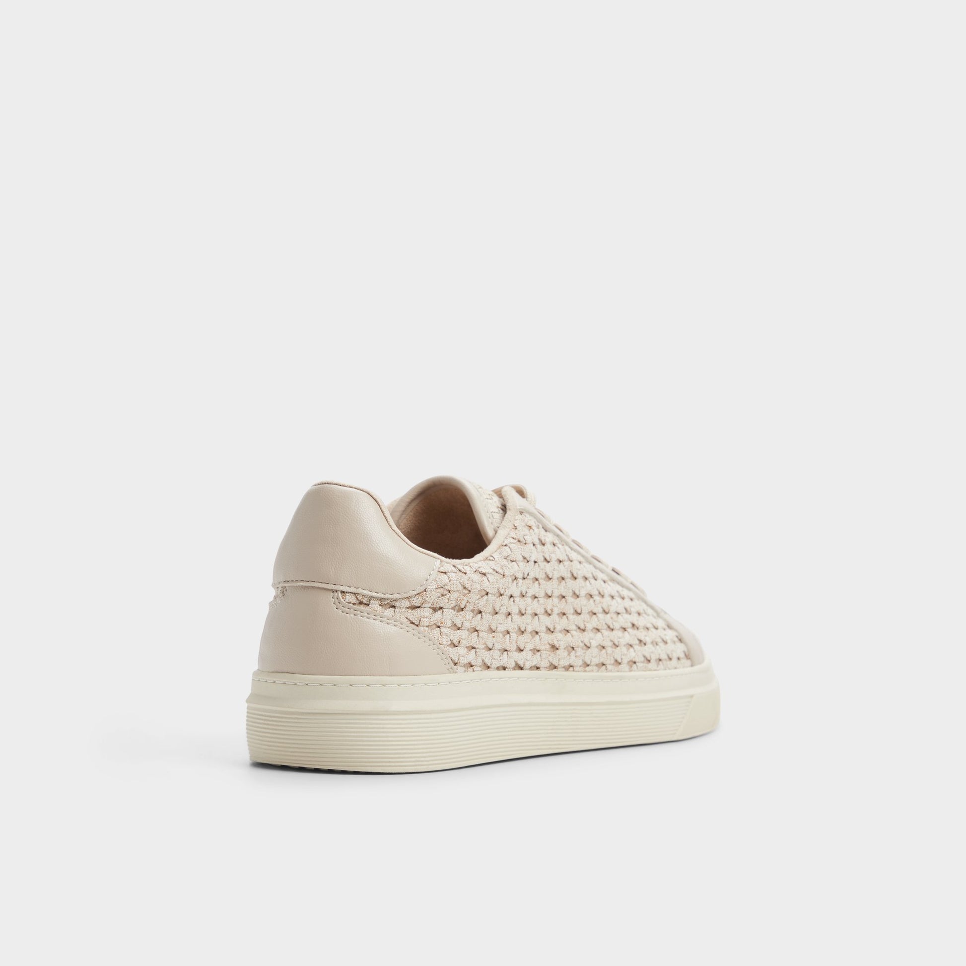 Three-quarter angle of Taupe Carsen Low top sneaker's back side