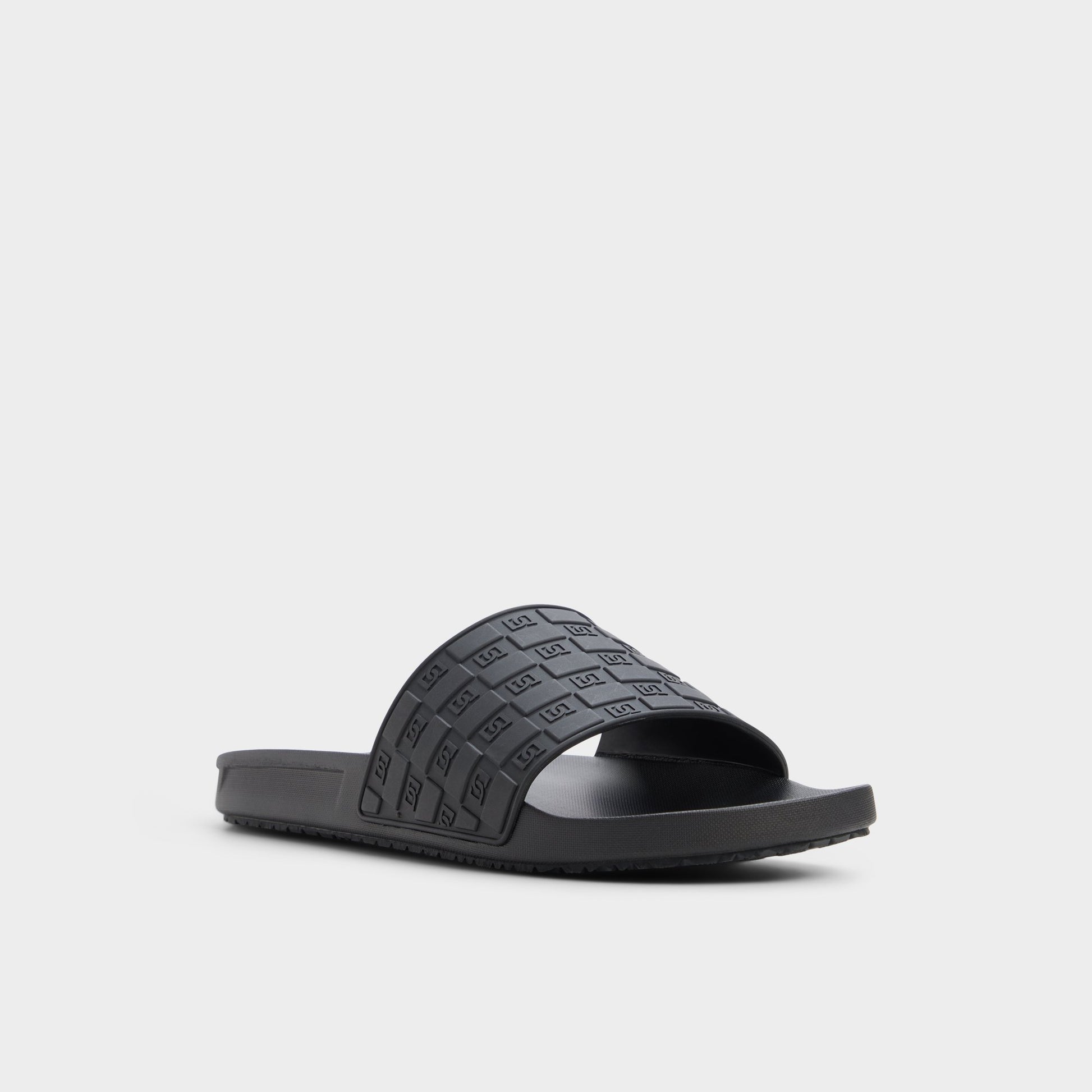 Three-quarter angle of Black Brax Slide sandal's front side