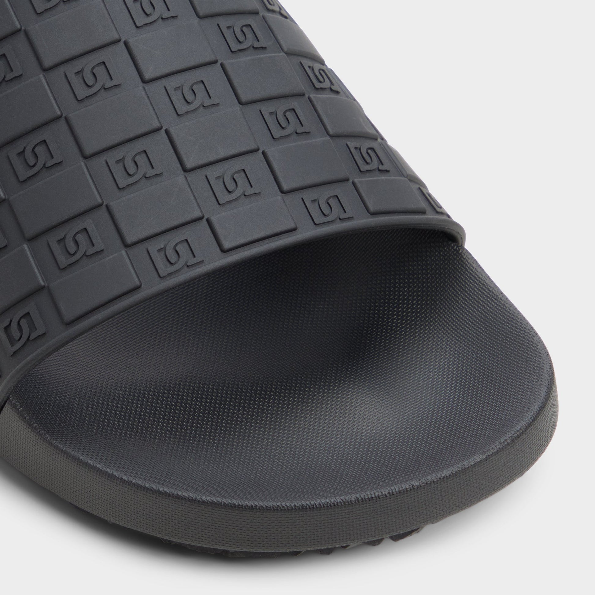 Close-up of the Black Brax Slide sandal