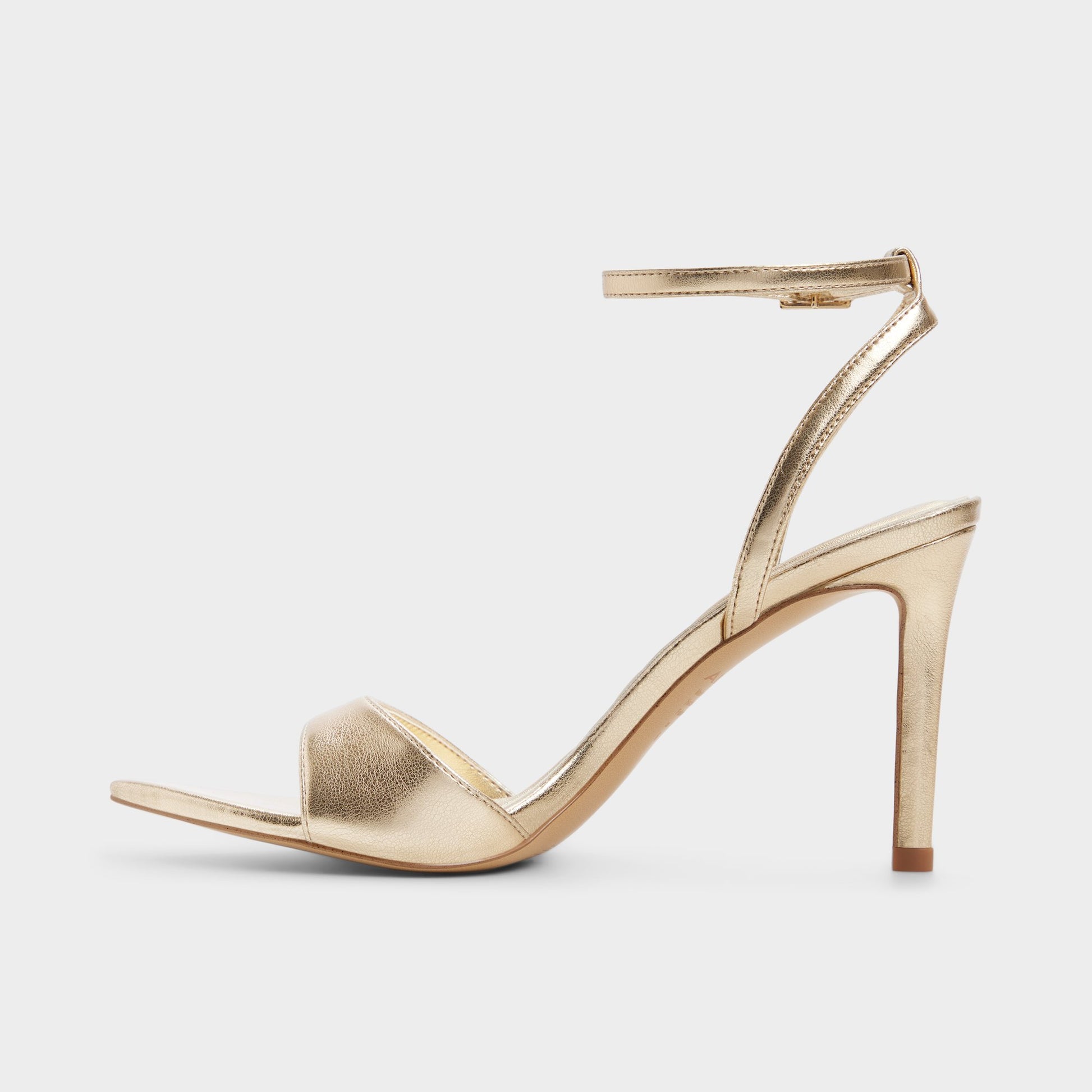 Side view of Gold Leandra Strappy heeled sandal