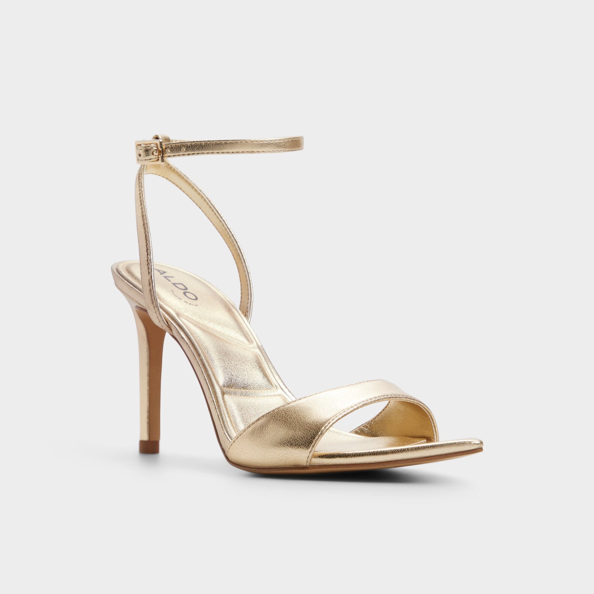 Three-quarter angle of Gold Leandra Strappy heeled sandal's front side