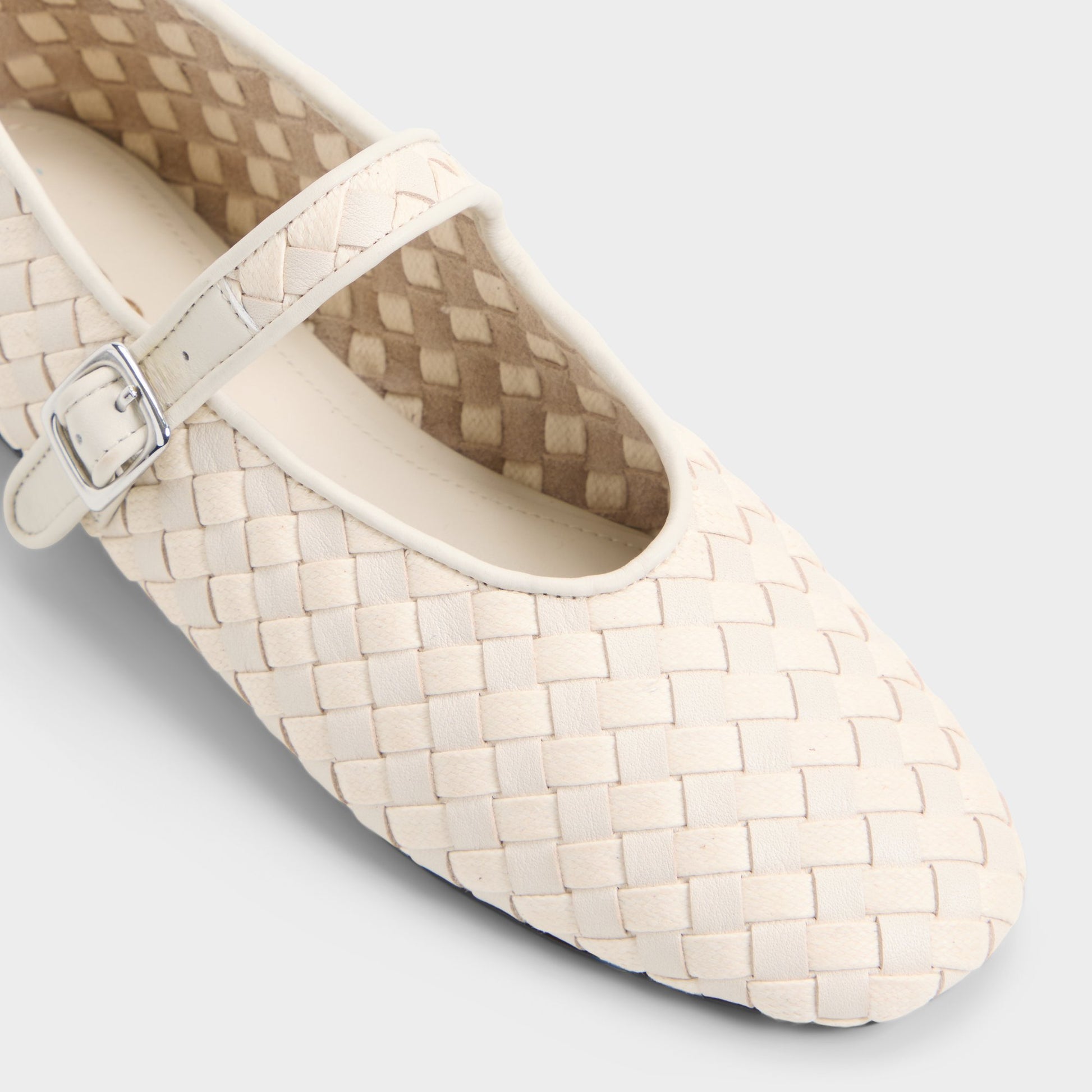 Three-quarter angle of Cream Alissia Ballerina's front side