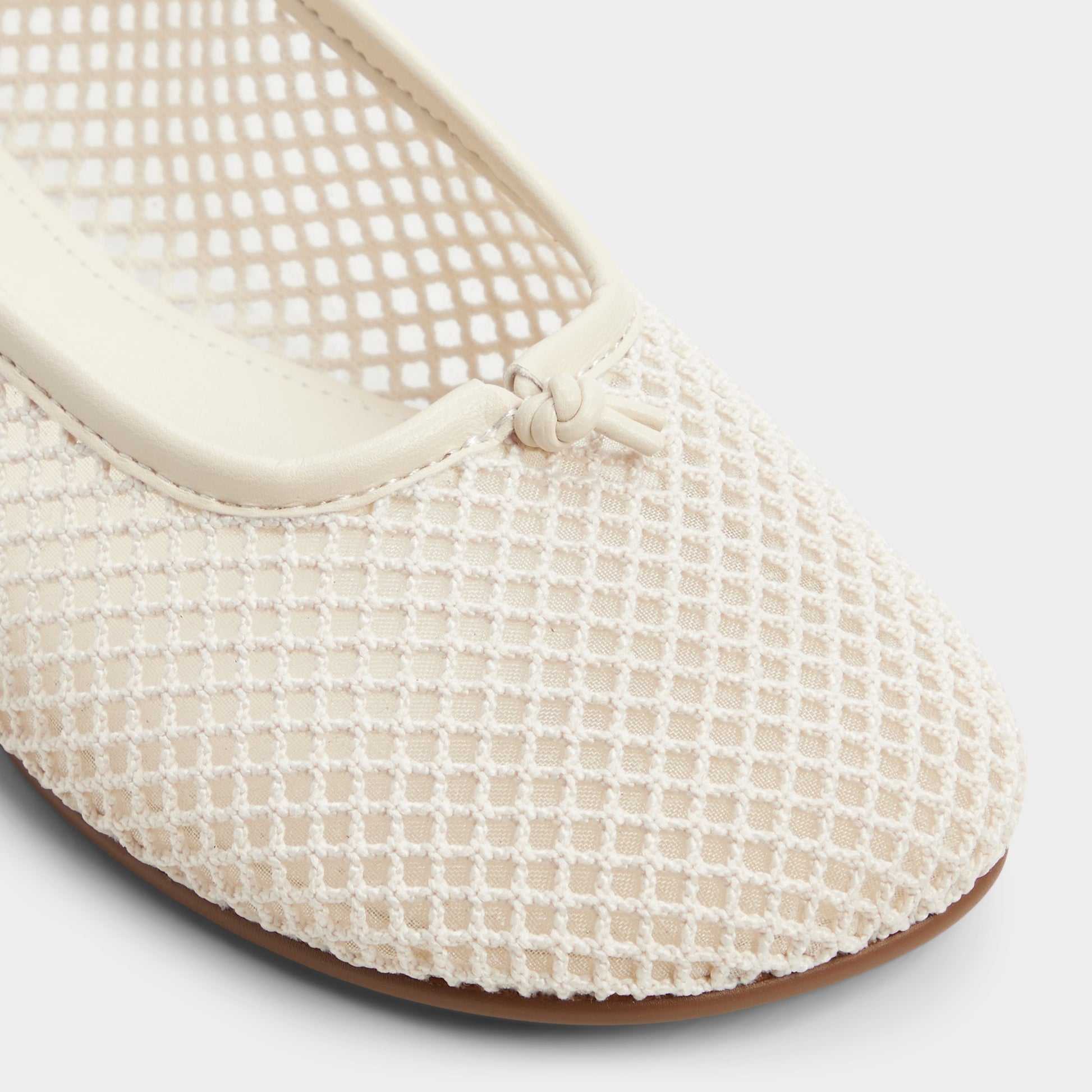 Close-up of the Other white Ericca Ballerina