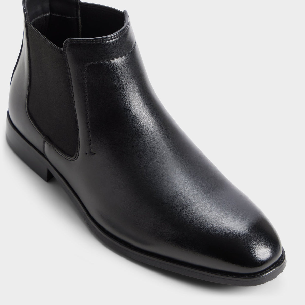 Three-quarter angle of Black Berny Chelsea boot's front side