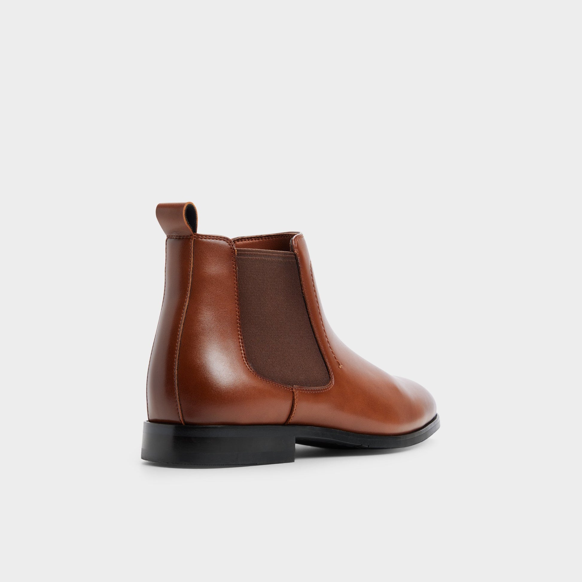 Three-quarter angle of Cognac Berny Chelsea boot's back side