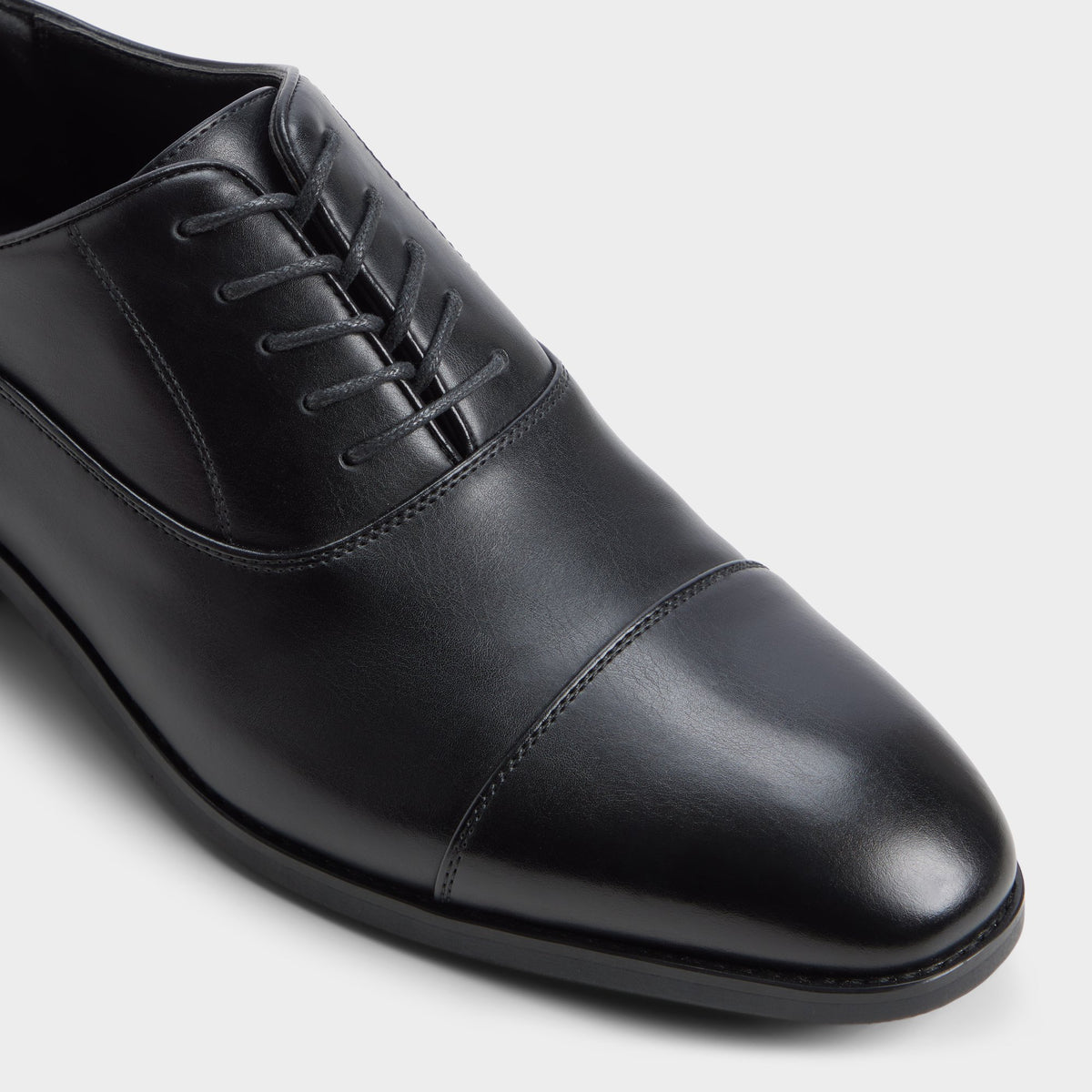 Three-quarter angle of Black Stewert Derby shoe's front side