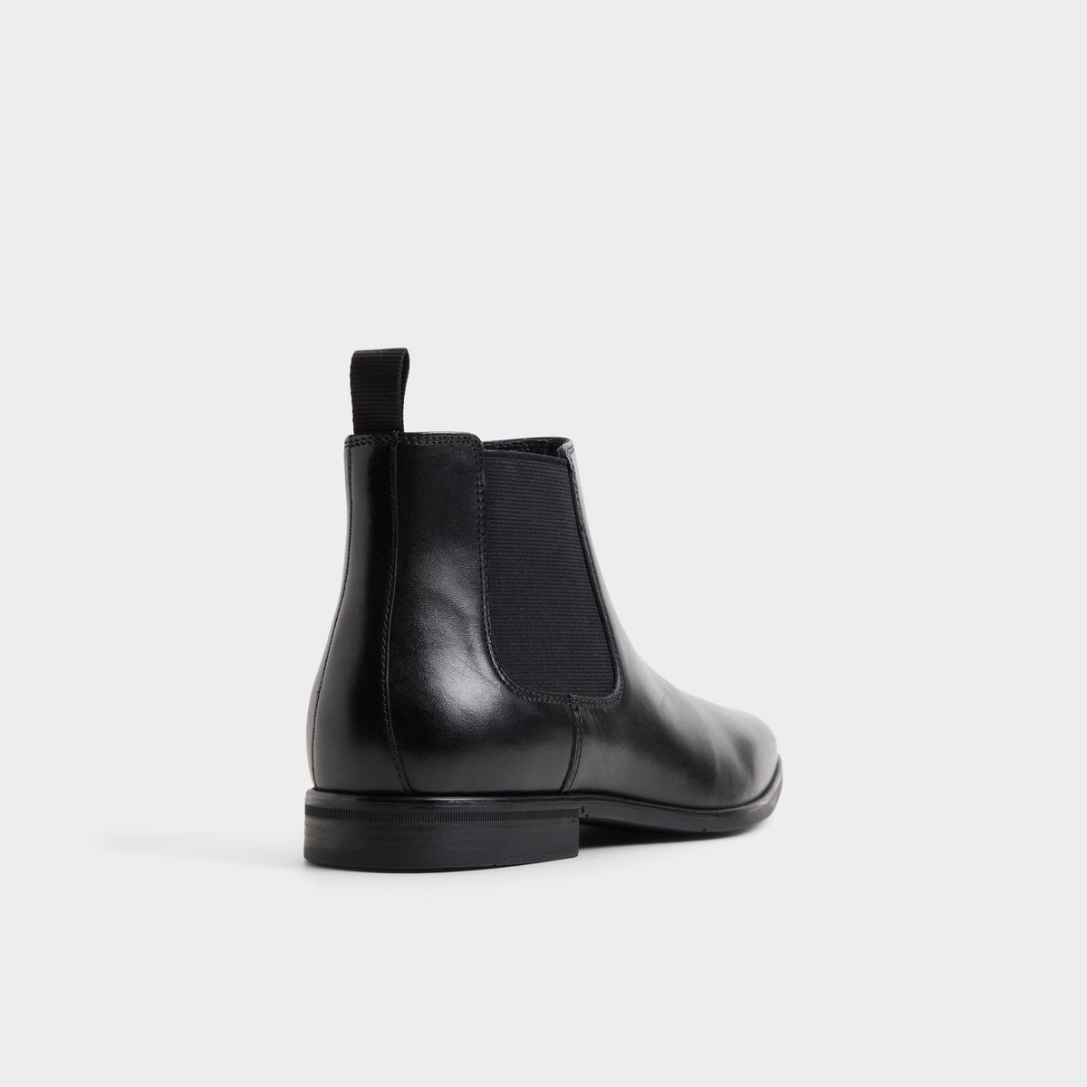 Three-quarter angle of Black Fionno Chelsea boot's back side